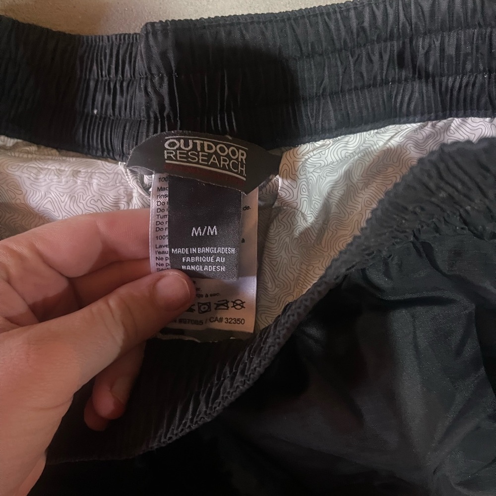 New, Outdoor Research rain pants.